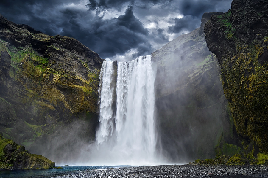 Skógafoss is shown here without its usual double rainbow, but beautiful nonetheless.